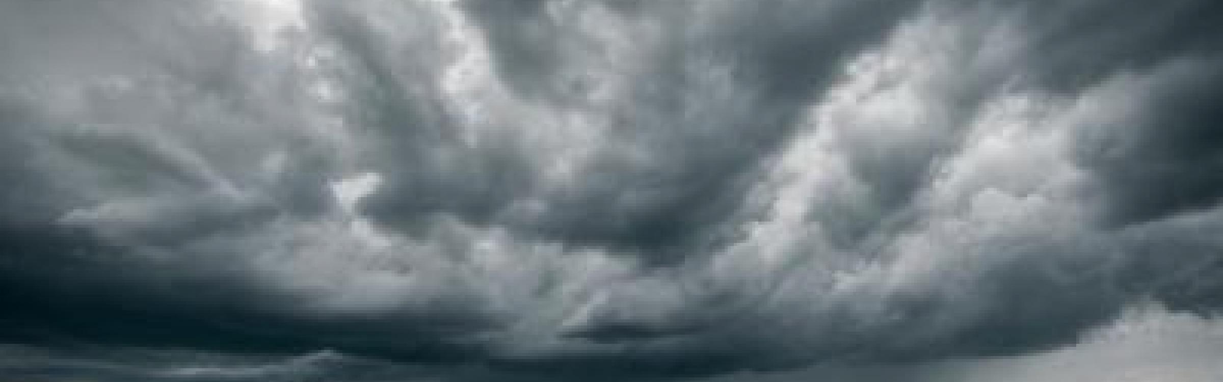 Een storm dat over de velden raast.