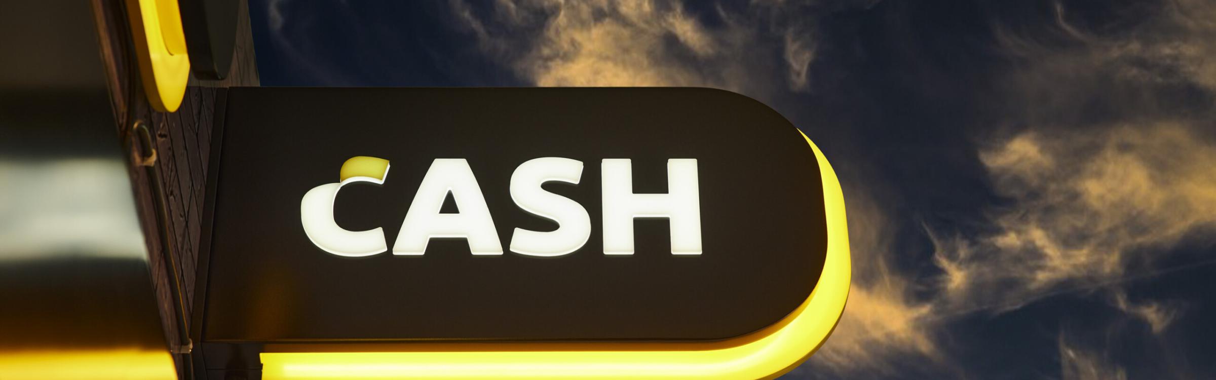 Verlicht bord met CASH erop